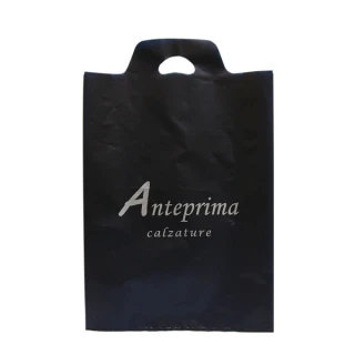 Shopper in plastica manico ricavato