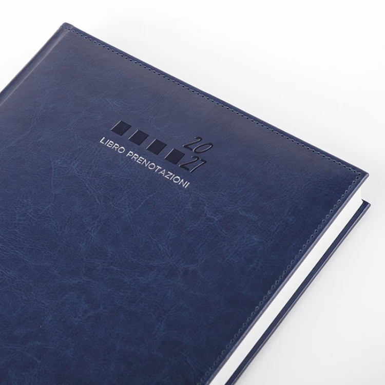 Libro prenotazioni giornaliero con interni multilingue, copertina in poliuretano termovirante, da personalizzare con logo aziendale